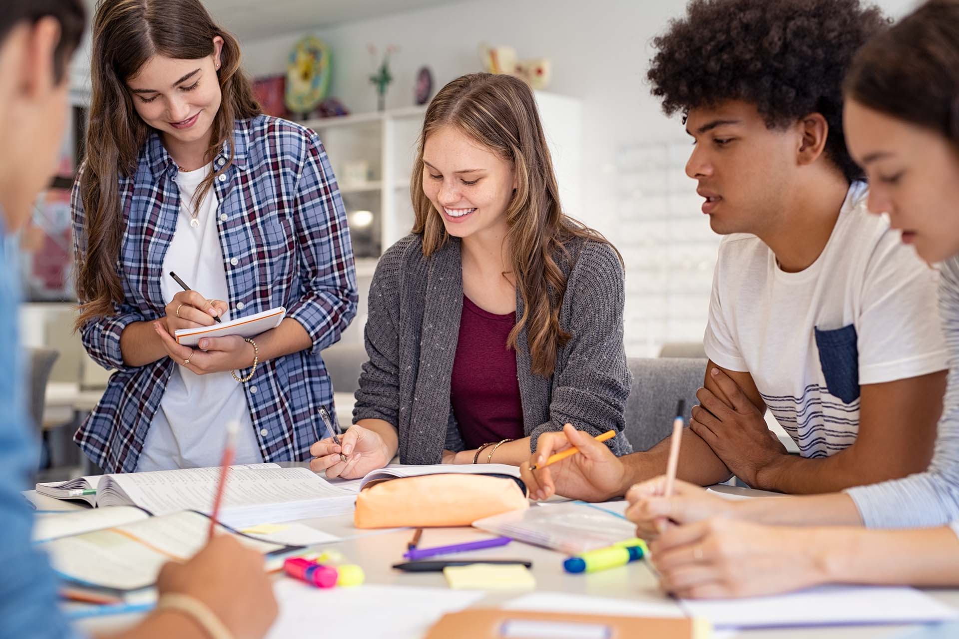 High school students working on group project